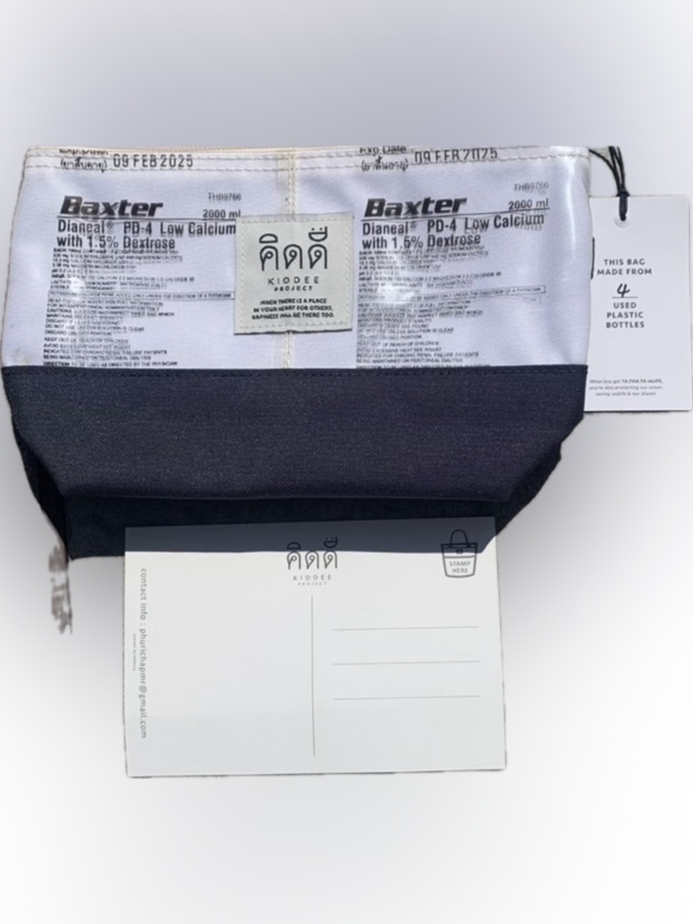 Unusual bag. Kiddee Project recycled IV bag pouch/wallet NWT & has a postcard.